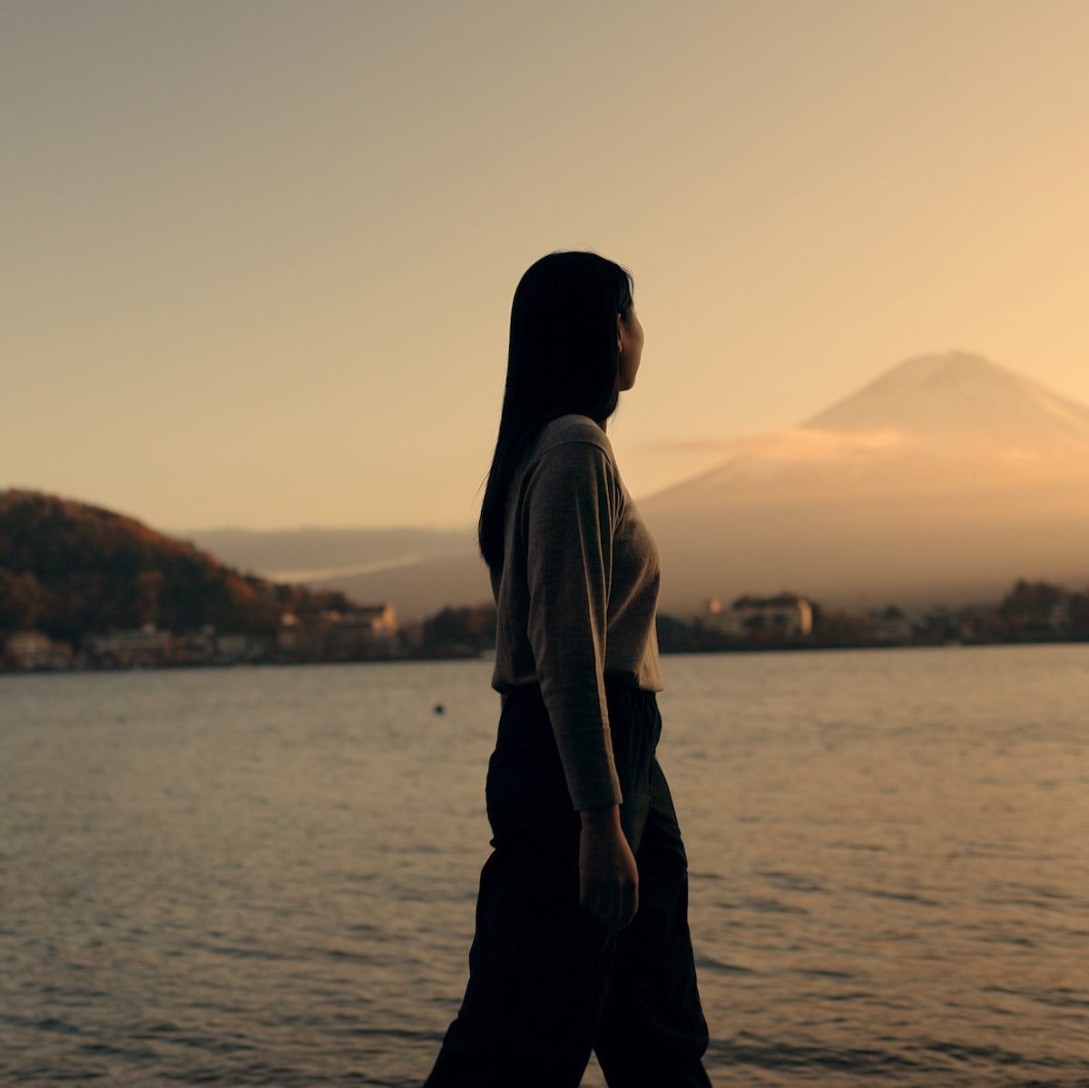 Woman, walking by river and nature with travel and journey outdoor, holiday or vacation with break. Environment, water and fresh air, traveller on adventure with peace, calm and wellness on trip Woman, walking by river and nature with travel and journey outdoor, holiday or vacation with break. Environment, water and fresh air, traveller on adventure with peace, calm and wellness on trip